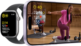 Apple Watch à côté d’un iPhone affichant une séance Apple Fitness+